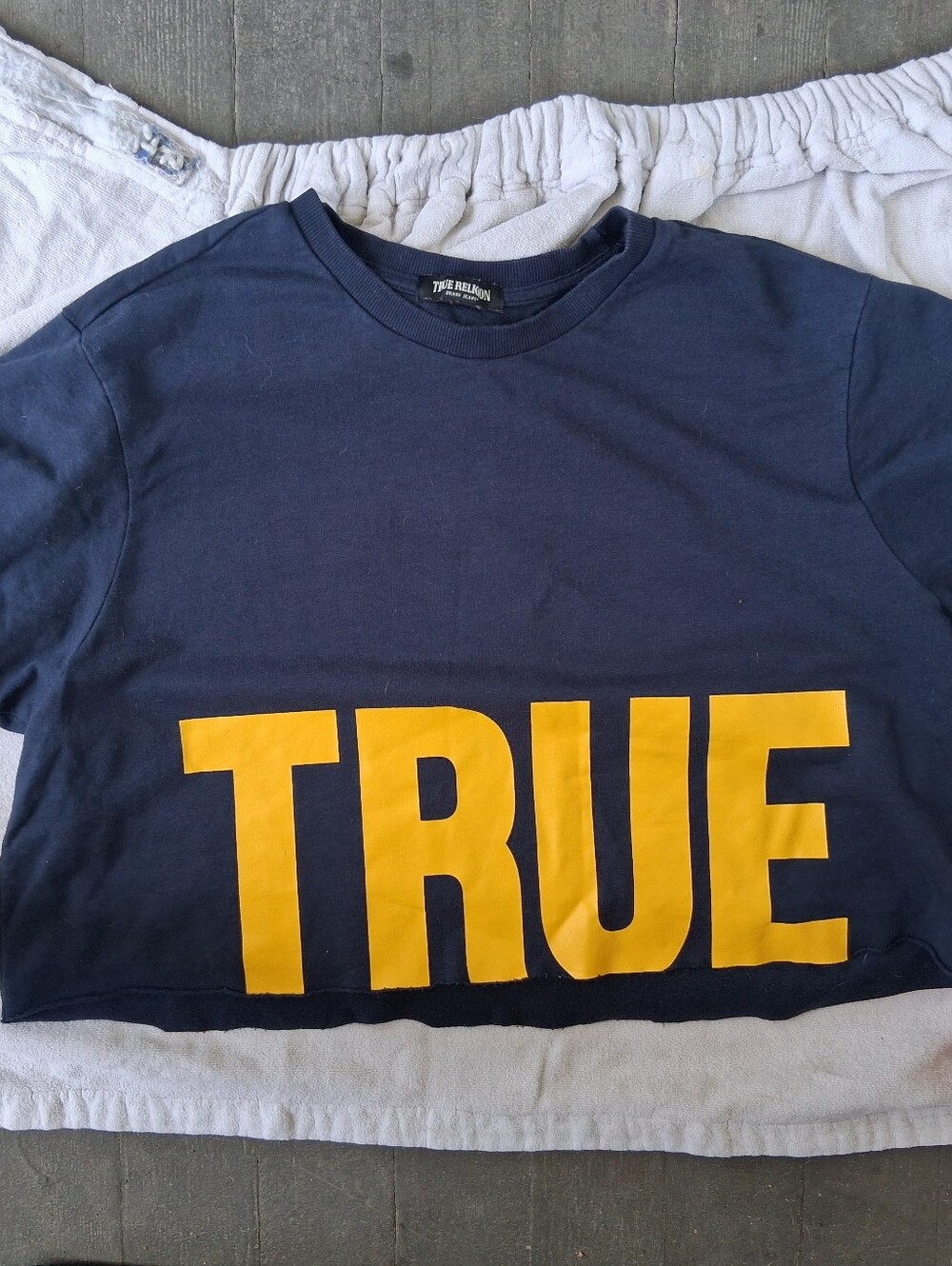 True Religion Navy Shirt with Bold Yellow TRUE Graphic